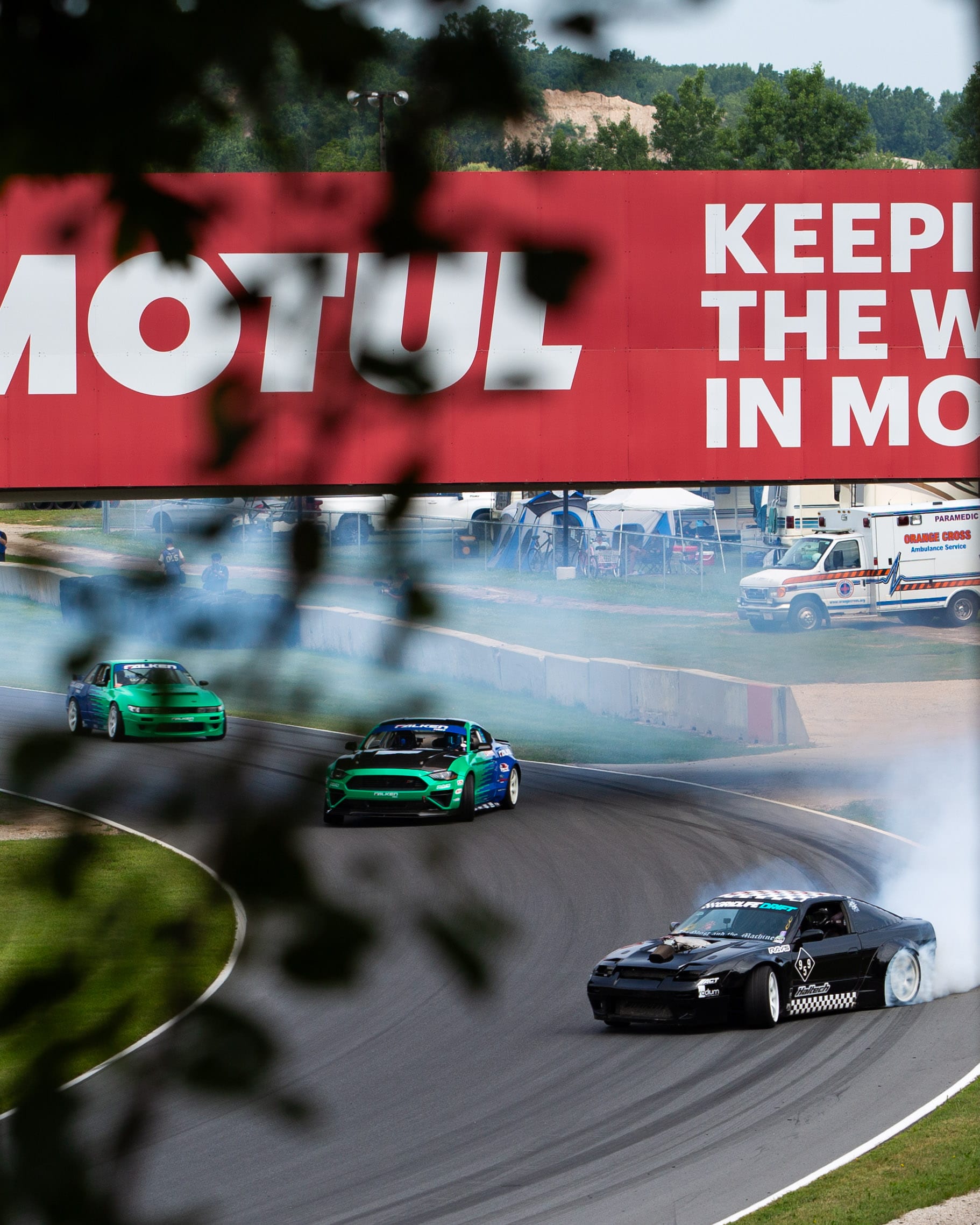 GRIDLIFE drift cars battling through a turn at Road America