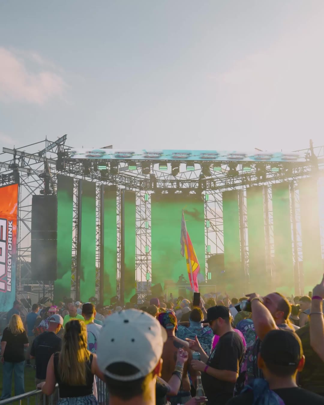 Festival crowd gathered at the main stage during golden hour