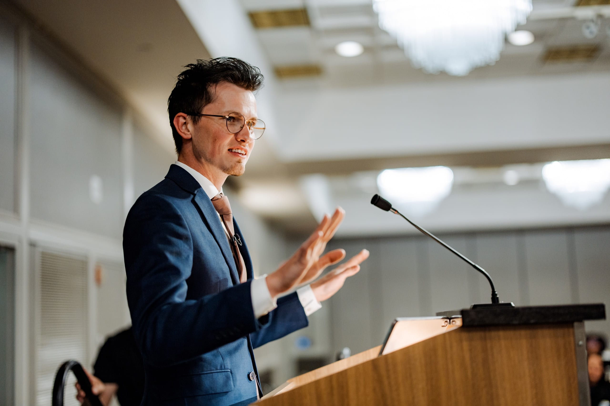 MetaMartini founder Alex Martinez presenting marketing strategy at an event